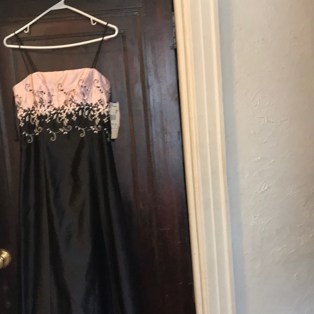 40.  New with tags floor length dress.
